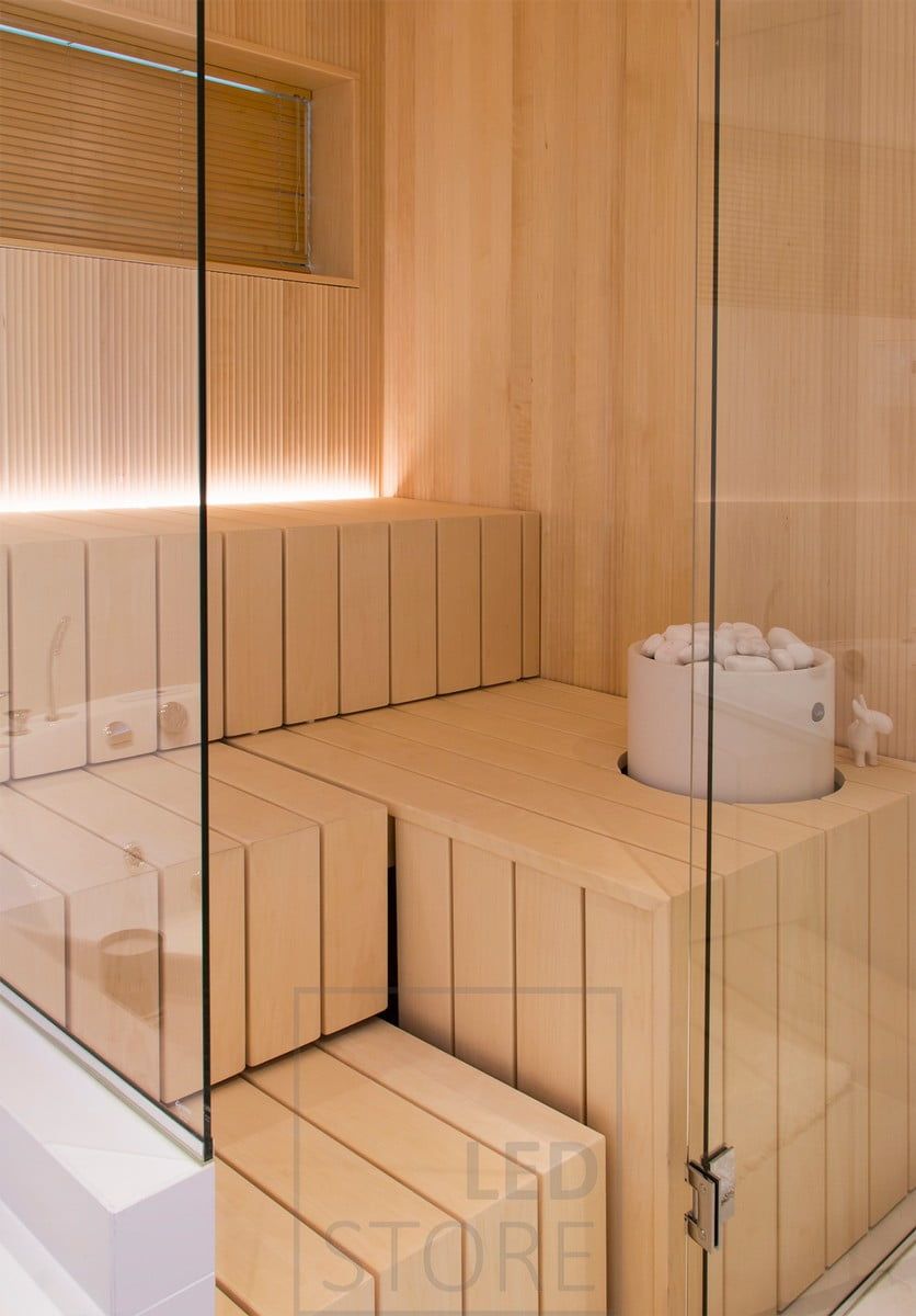 Atmospheric sauna lighting. Led strip behind the bench illuminating from bottom to top. Ledstore.fi