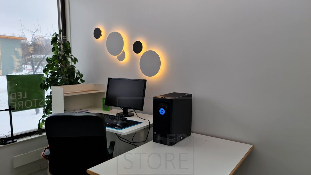 In the study, Eclipse wall lights in two different sizes, in two different colours to provide indirect mood lighting. Ledstore.fi