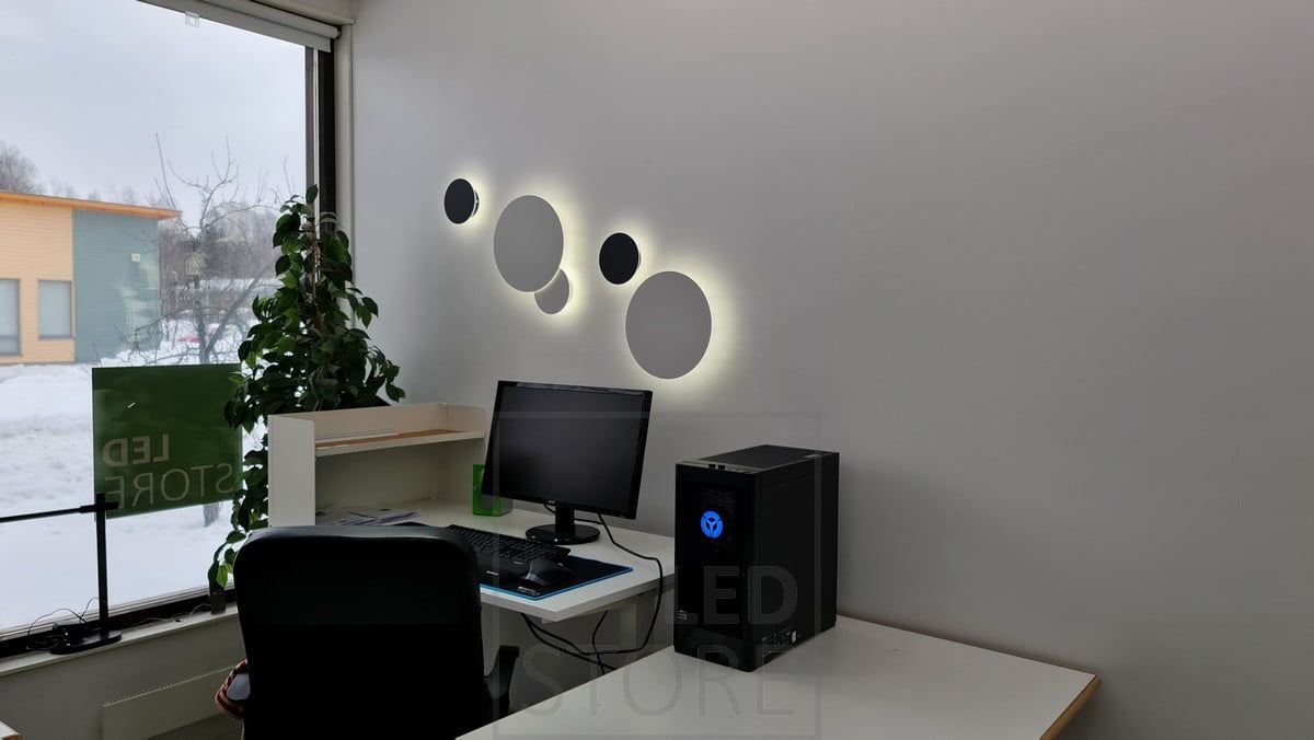 Eclipse wall lights in two different sizes, in two different colours, illuminating indirect light. The luminaires can be assembled to create the exact ensemble you want and the light is colour temperature adjustable. Ledstore.fi