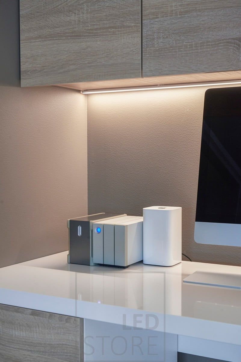 Led strip indirectly illuminating the back wall of a workstation. The light is atmospheric and pleasing to the eye. Ledstore.fi