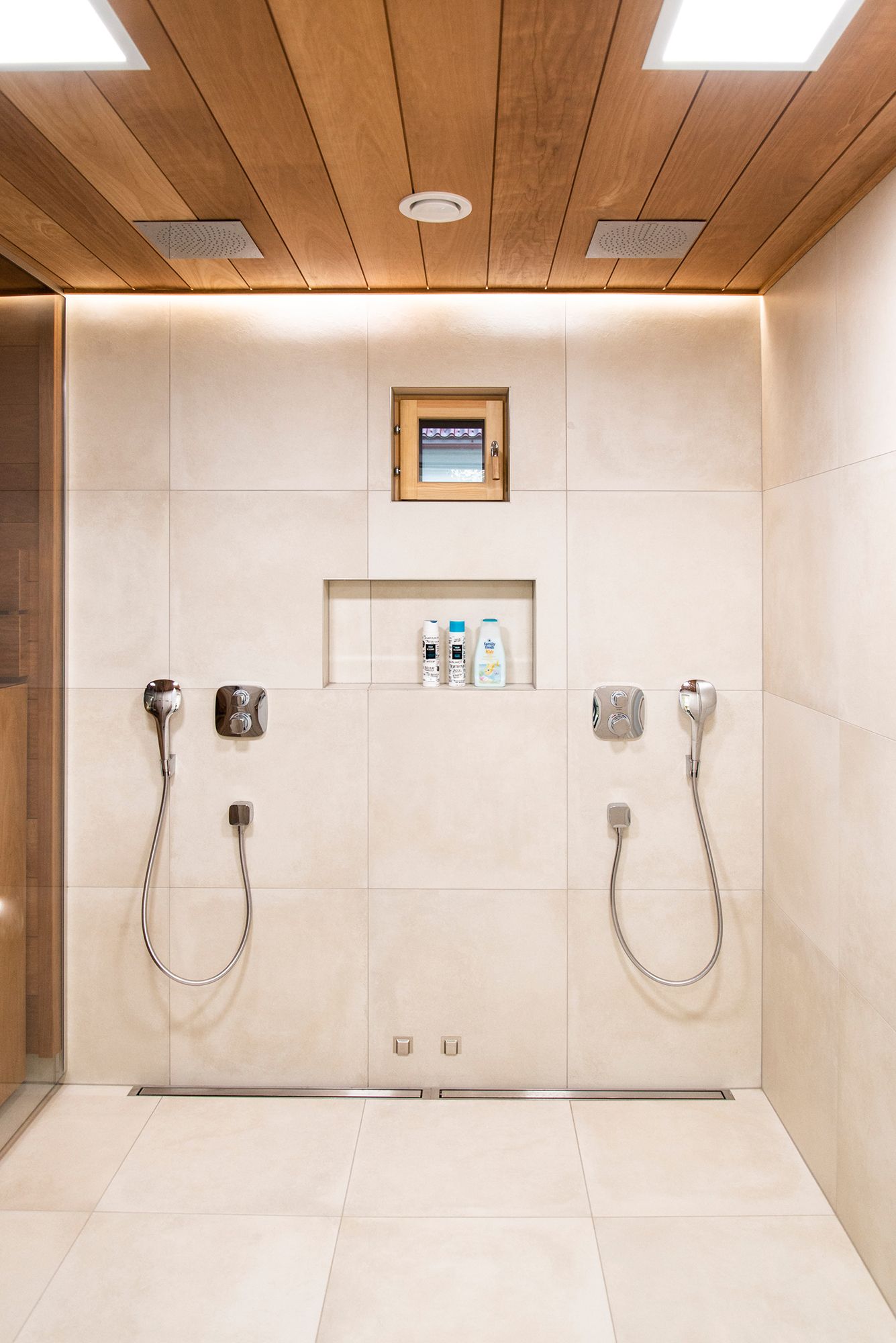 In the washroom, two panel lights combined with a led strip behind the shower. Ledstore.fi