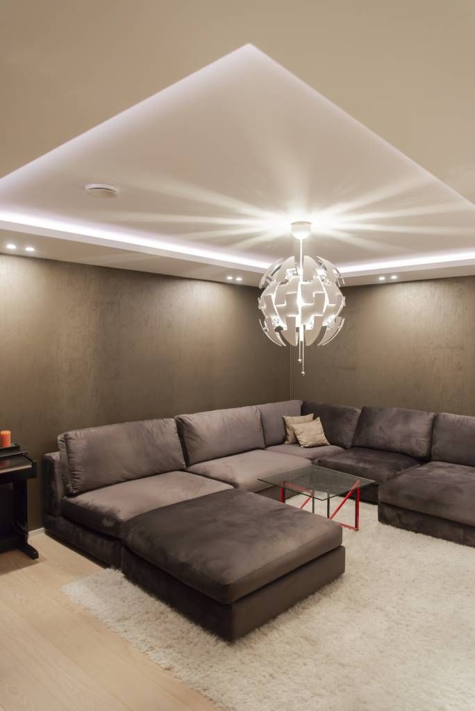 Indirect RGB-led strip lighting in a cinema room circulates around the room in a downlight clip, white light colour. © LedStore