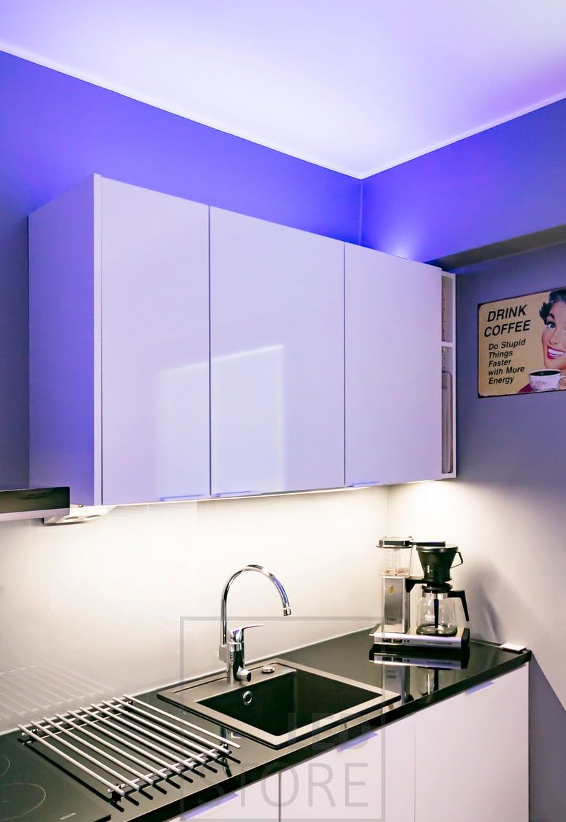 Customizable mood lighting in the kitchen above the cabinets with RGB+W led strip, the light colours can be adjusted steplessly with wired or wireless control. Ledstore.fi