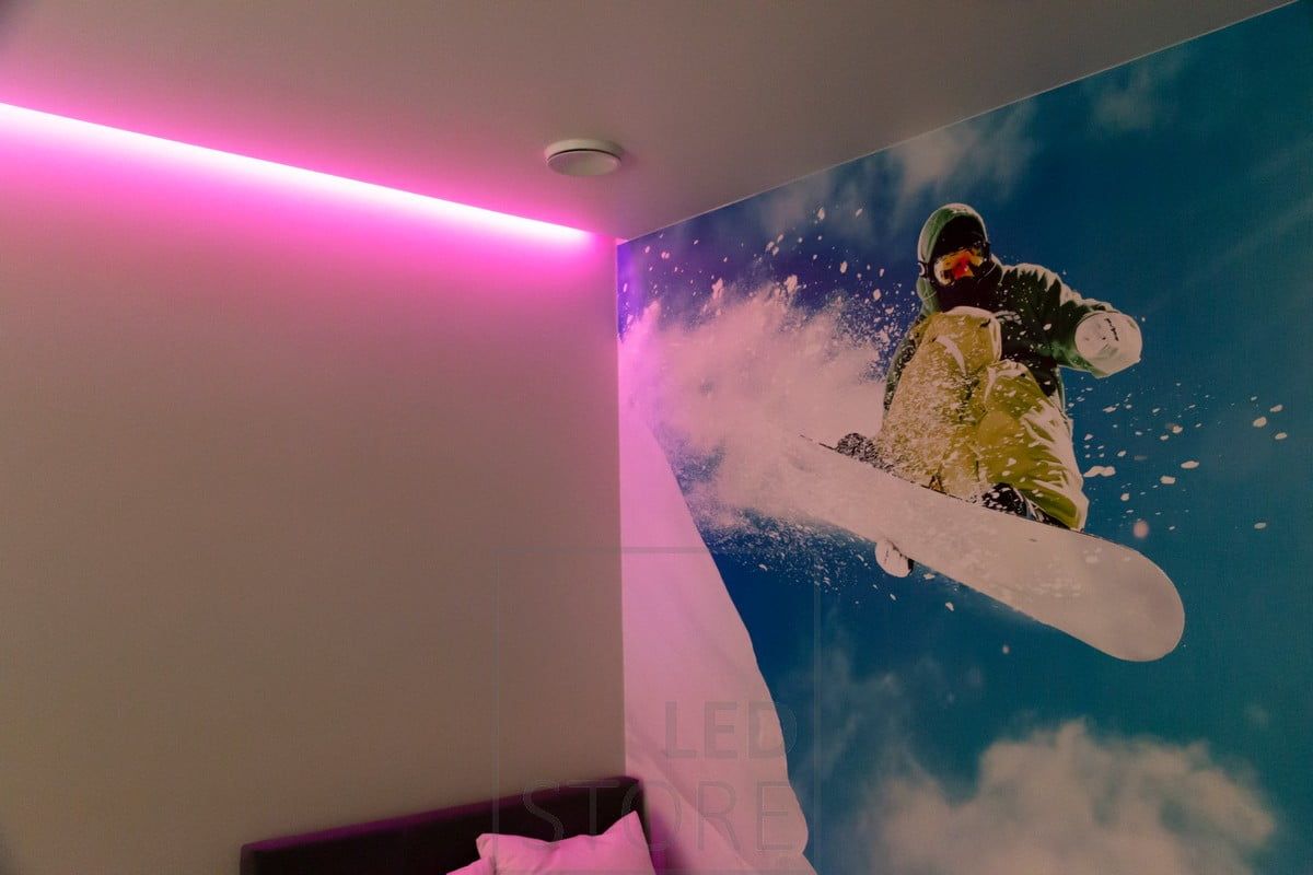 RGB ribbon creating mood lighting in the bedroom, indirectly illuminating. Colours are infinitely adjustable with wireless or fixed control. Ledstore.fi