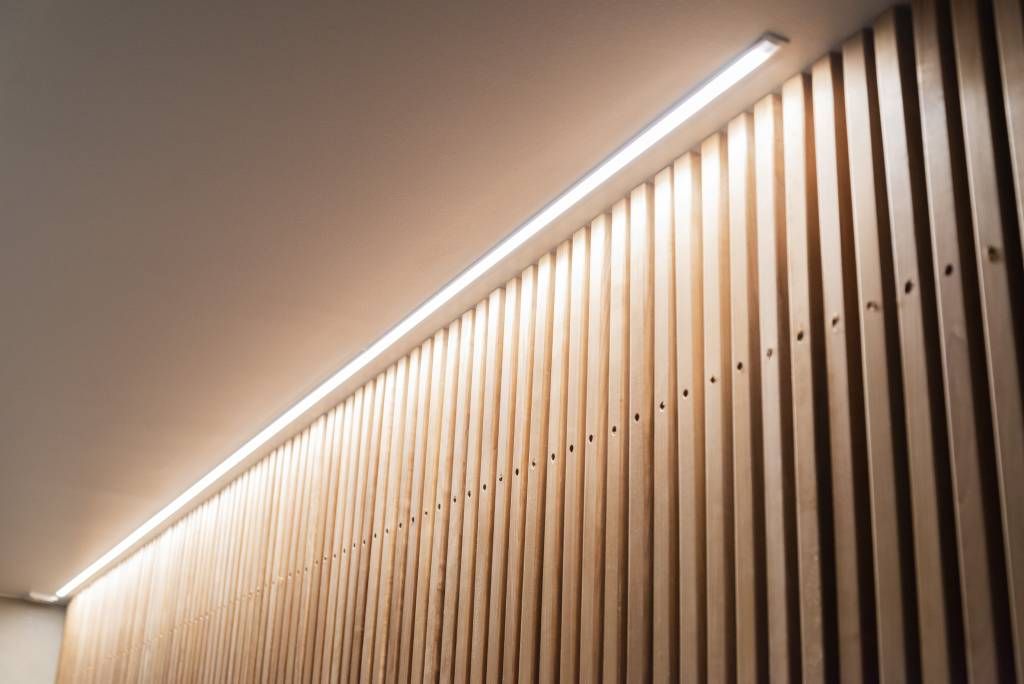 Beautiful recessed LED strip lighting in the sauna corridor. © LedStore