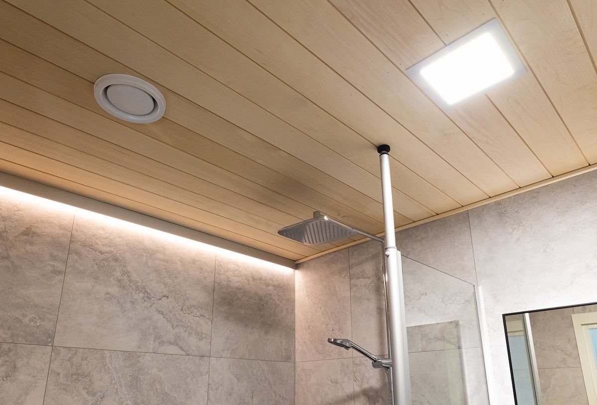 Indirect LED strip lighting with adjustable warm colour temperature. General lighting comes from waterproof Paneeli200 luminaires. ©LedStore