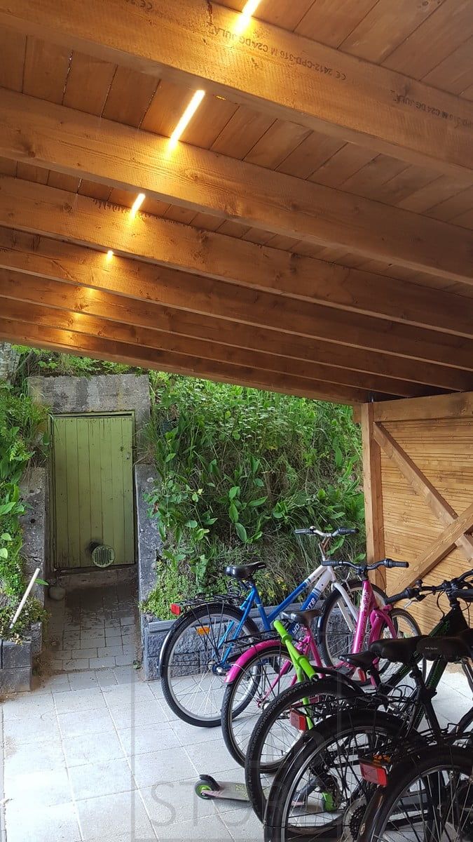 Led ribbon beautifully illuminating a bike cover. Ledstore.fi