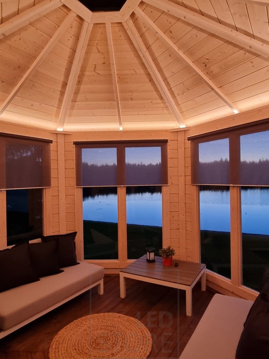 A beautiful ceiling accentuated with indirect lighting, creating mood lighting in the space. Ledstore.fi