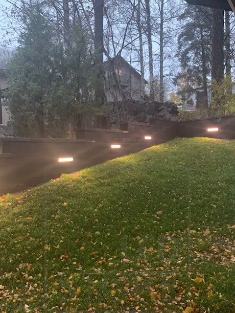 Led ribbon embedded in a wall to create an elegant and atmospheric lighting in the yard. Ledstore.fi