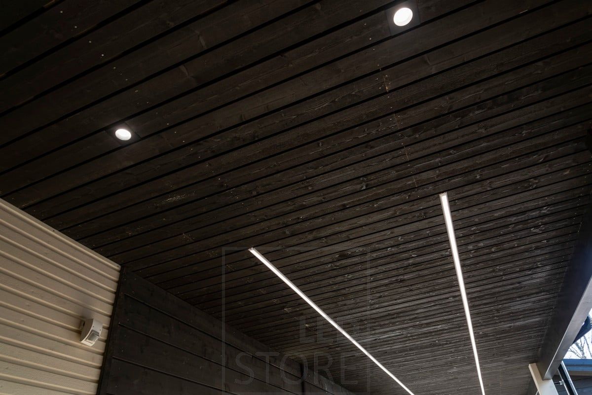 Spotlights and led strip illuminating an outdoor canopy. Ledstore.fi