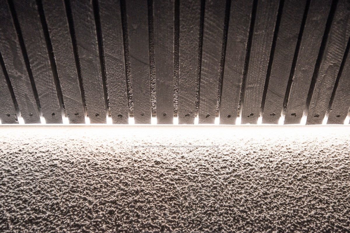 Indirect lighting outdoors in a groove between the roof and the wall. Ledstore.fi