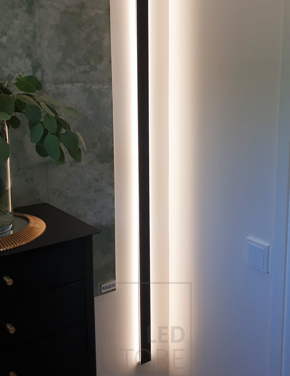 Wall mounted bi-directional illuminated profile with LED strips in both directions. Ledstore.fi