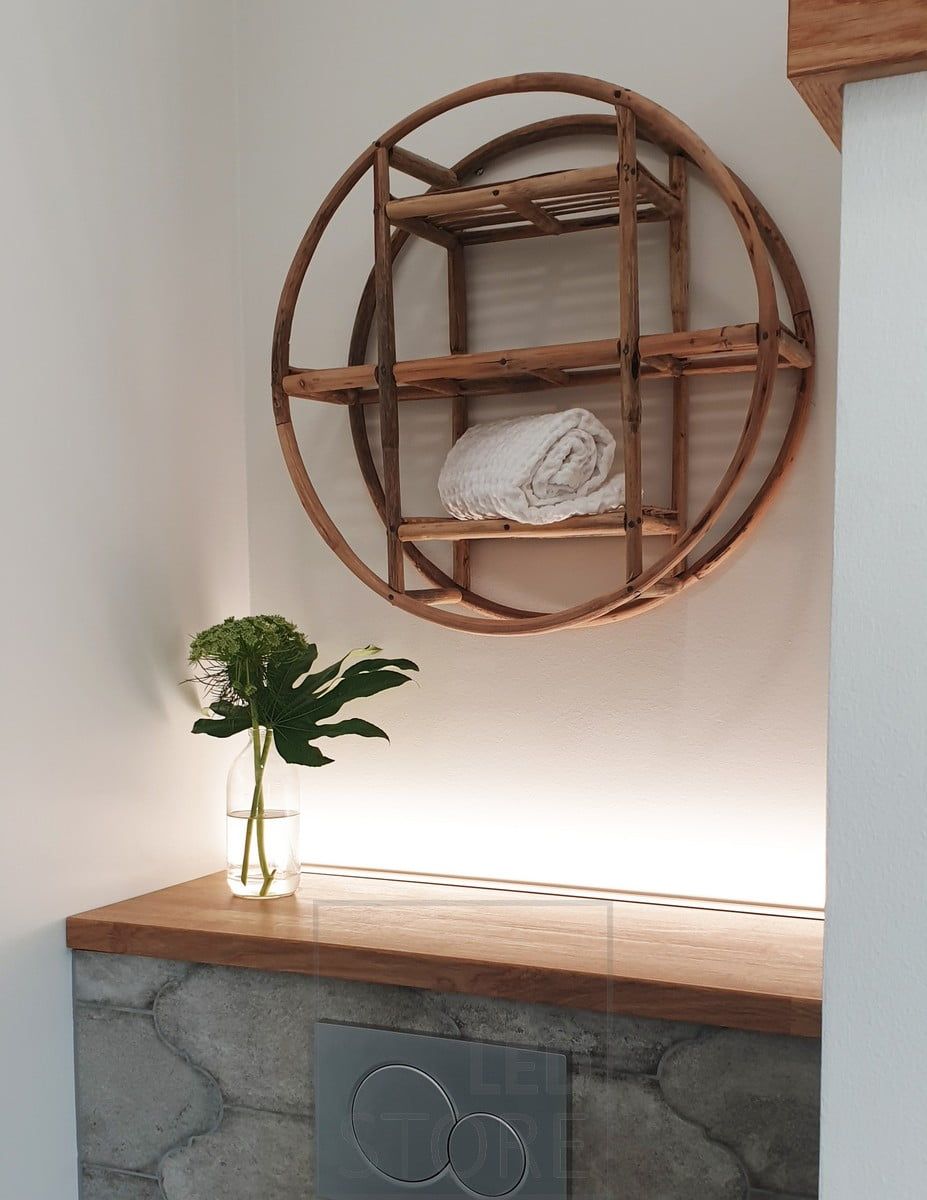 Behind the toilet housing, a LED strip facing upwards, creating a beautiful mood light. Ledstore.fi