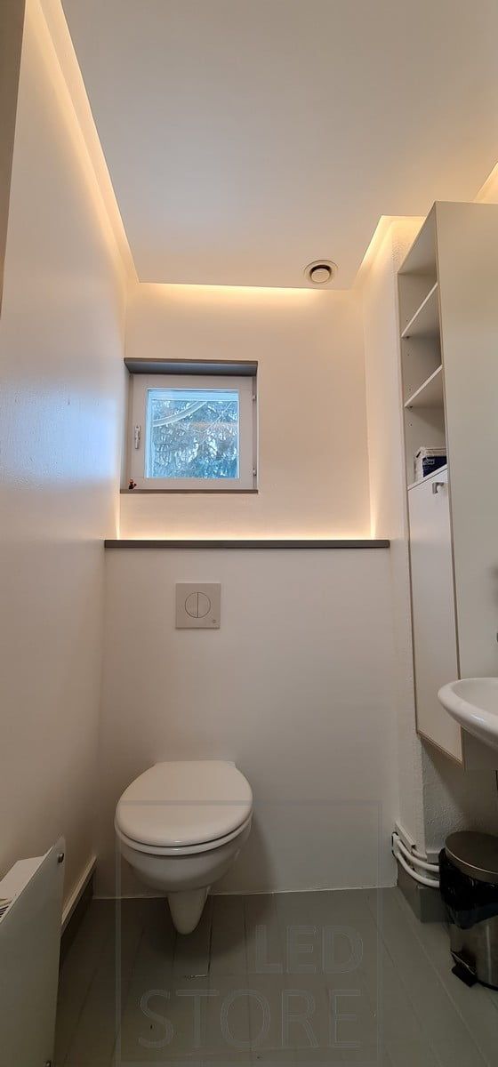 Indirect lighting for the entire bathroom. The LED strip in the toilet housing also functions as a night light, switched on by a motion sensor. Ledstore.fi
