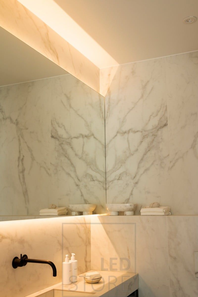 Behind the mirror, a led strip indirectly illuminates, creating mood lighting in the toilet space. Ledstore.fi