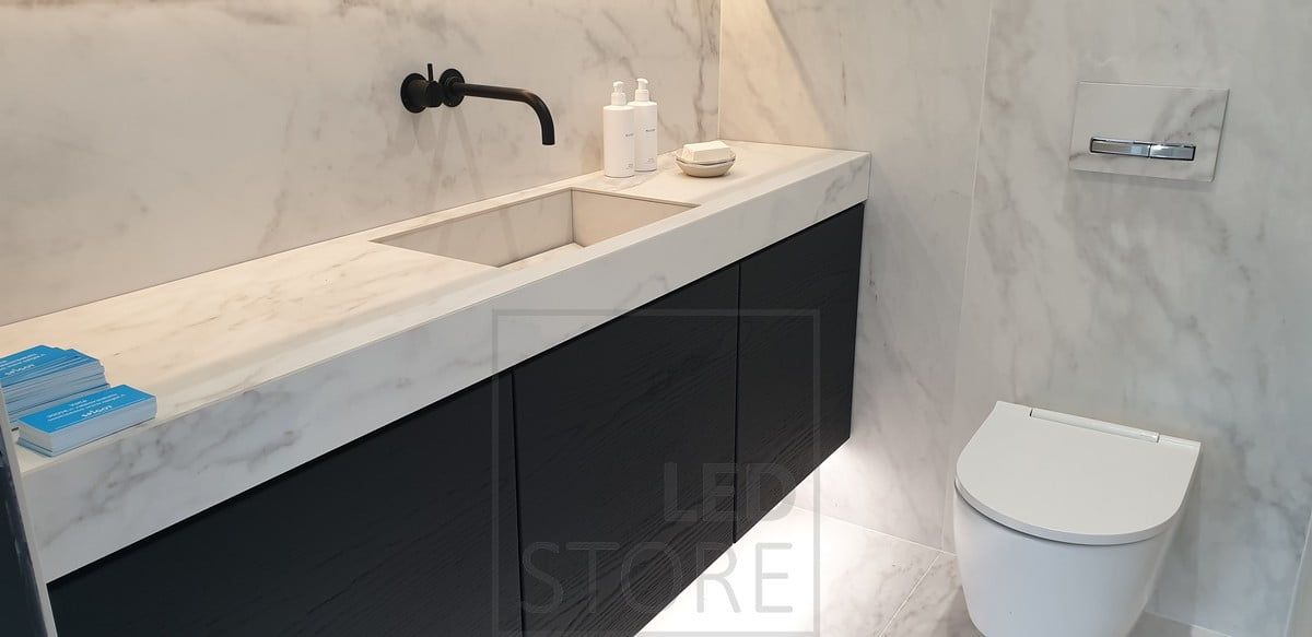 Led ribbon under the level of the toilet compartment for pleasant indirect lighting. Ledstore.fi