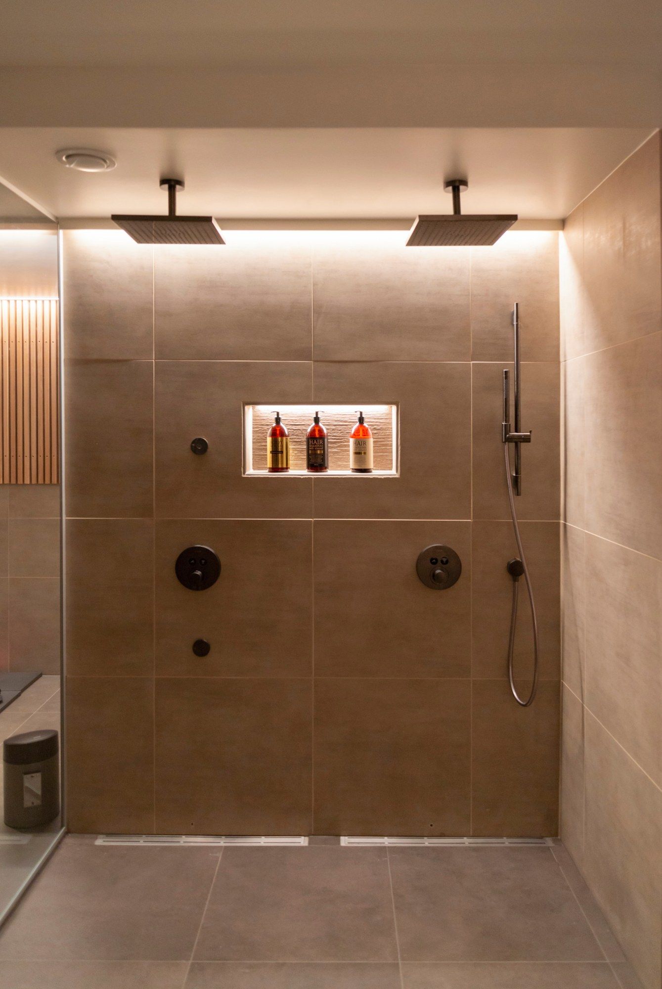 Dazzling LED strip light on the ceiling and shampoo shelf for relaxing showers LedStore.fi
