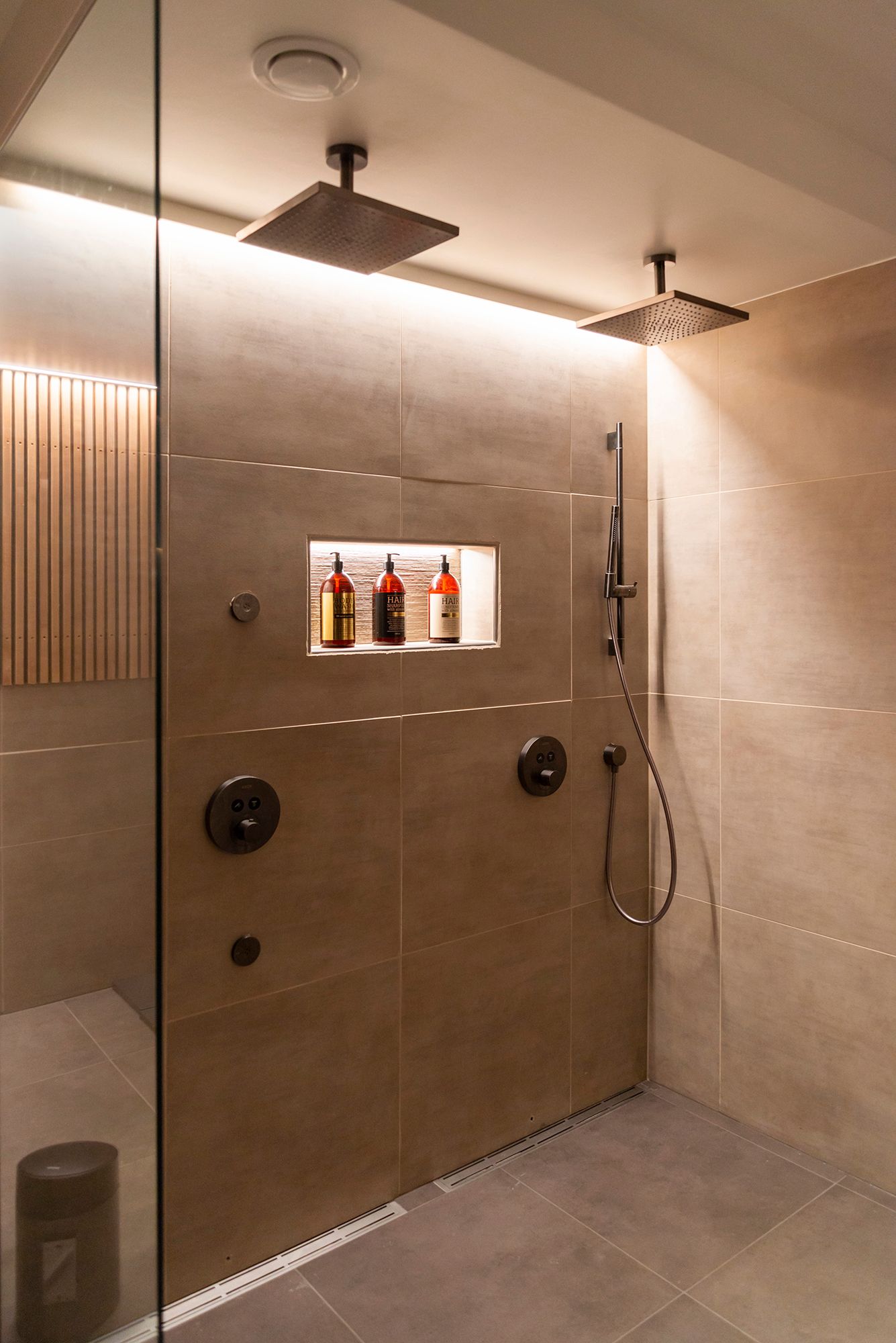 Dazzling LED strip light on the ceiling and shampoo shelf for relaxing showers LedStore.fi