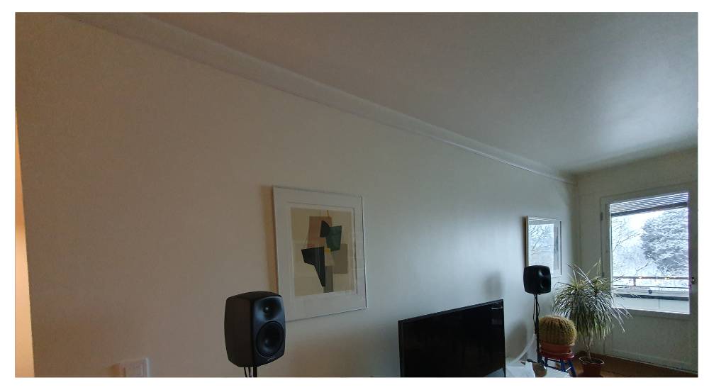 The installed indirect lighting in the living room is neat