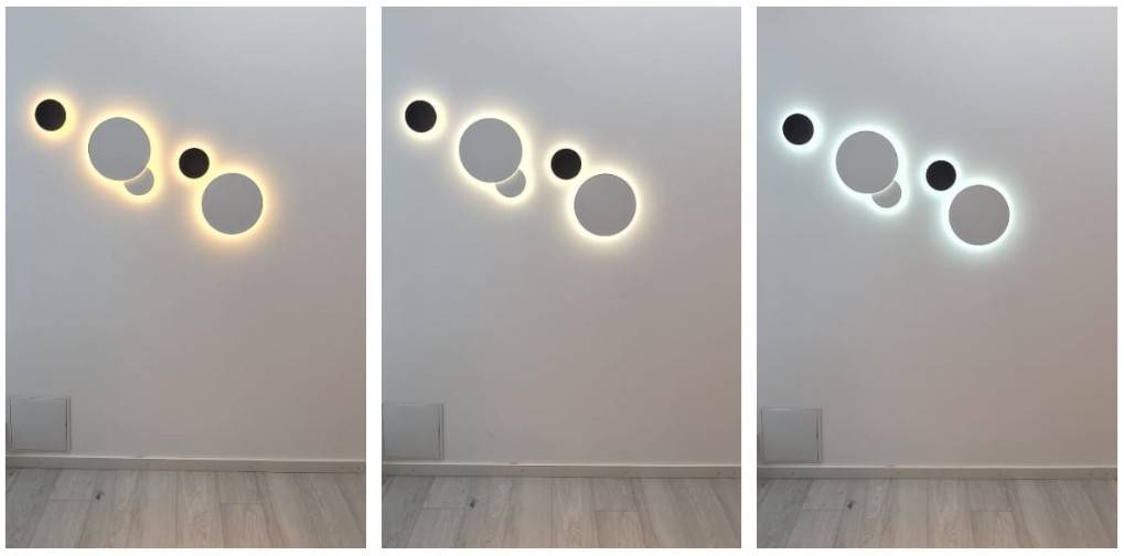 Eclipse round wall lights grouped in a series of five lights.