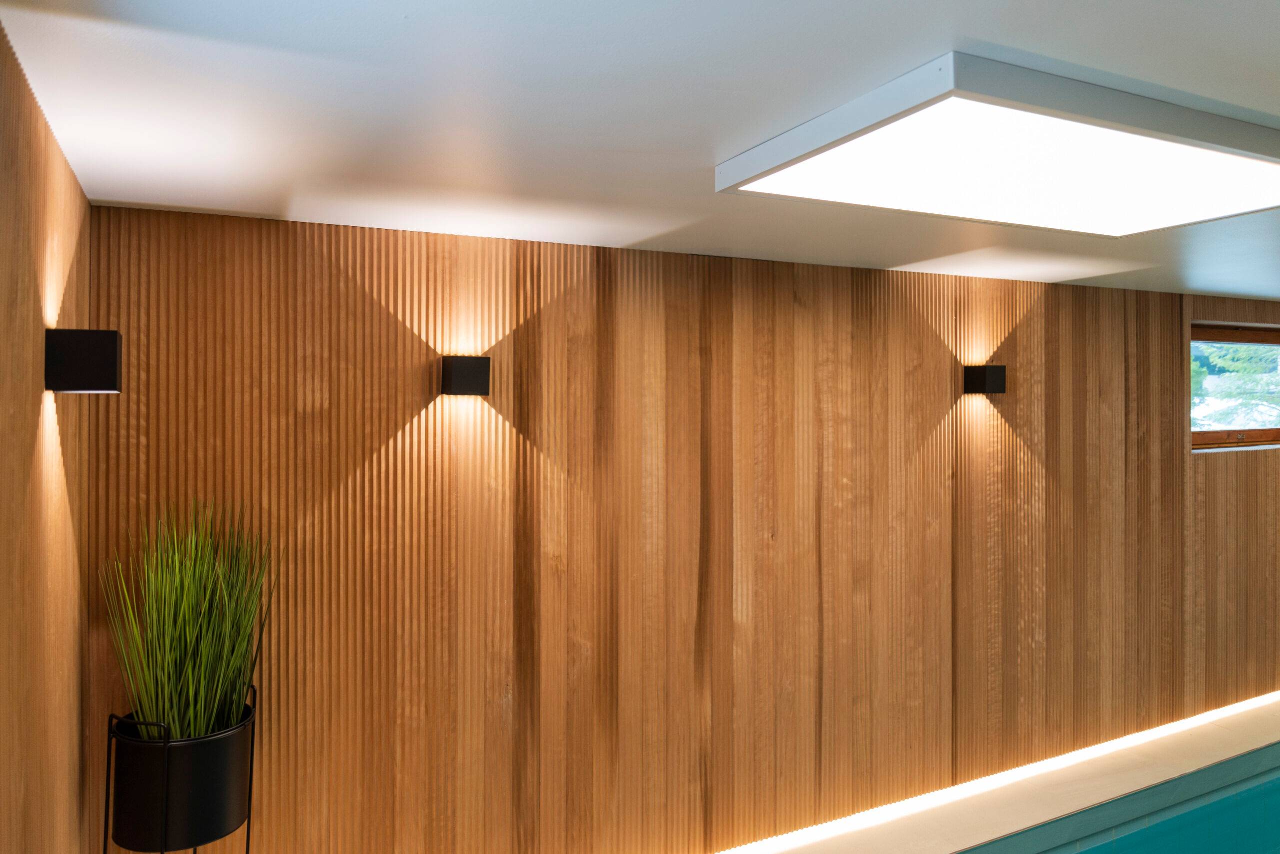 LED wall lights as part of the pool area lighting.