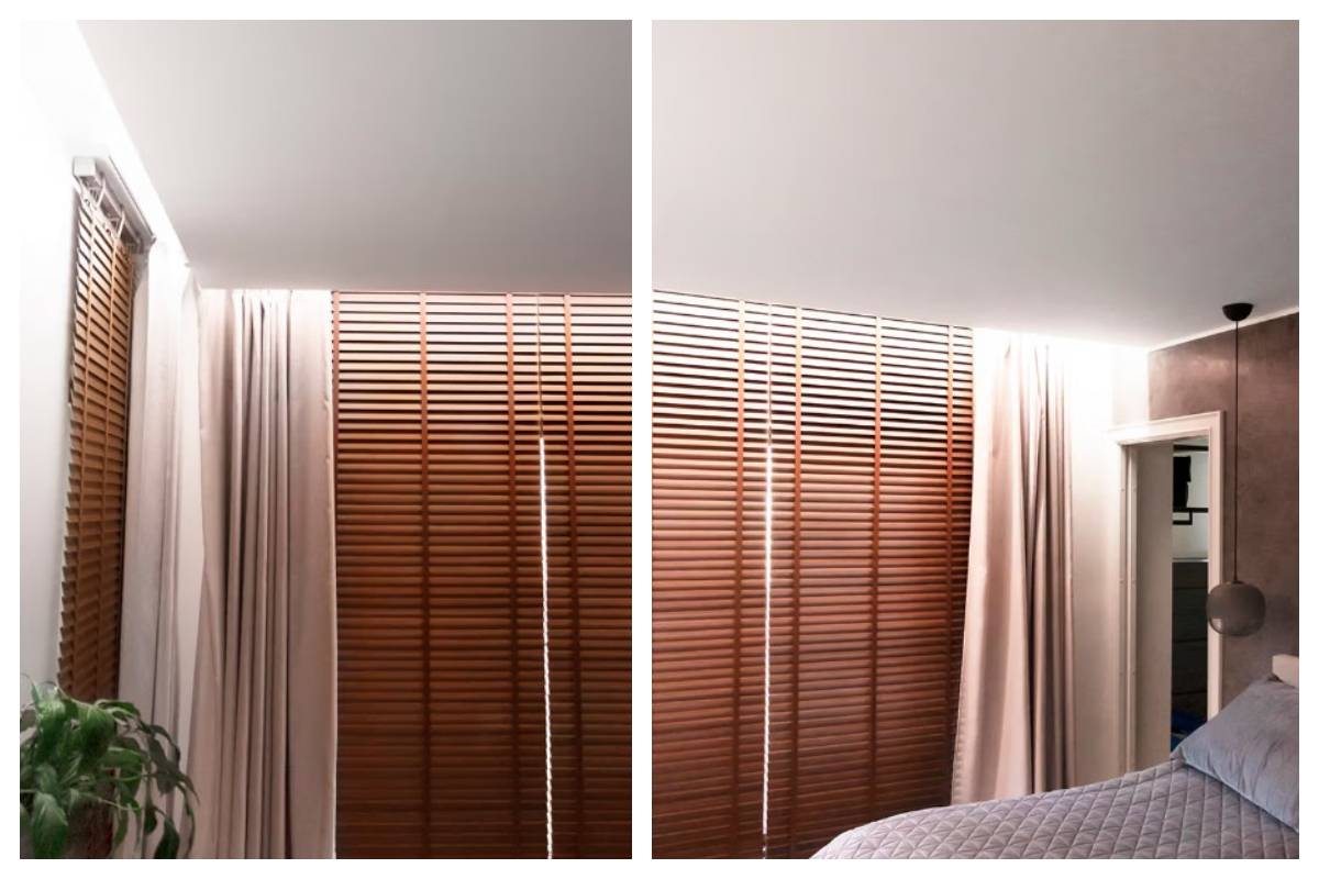 A modern bedroom in Kaitamäki, Espoo - wooden blinds, beige curtains, greenery and a neatly made bed create the atmosphere of a peaceful family home. The whole is complemented by LedStore.fi's carefully designed LED lighting, which emphasises the cosiness and style of the space. 