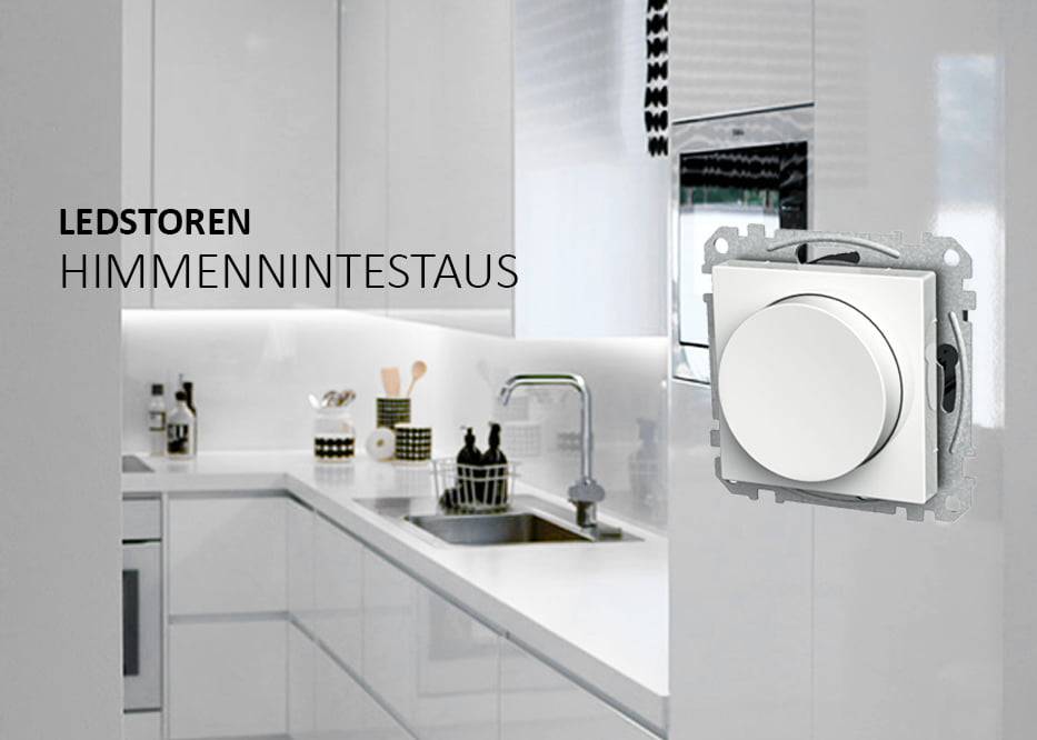 Modern kitchen with white cabinets; large circular dimmer switch in the front to control the LED lighting, with the text "LEDSTOREN DIMMING SET" on the left.