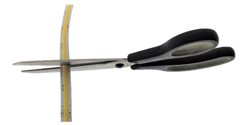 Cutting an LED strip with scissors