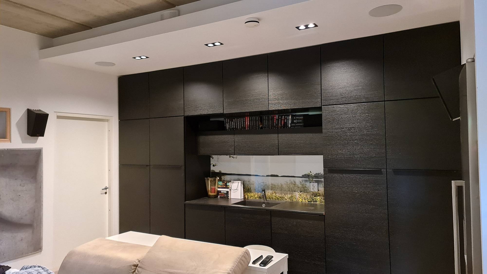 Spots in the black kitchen warm light