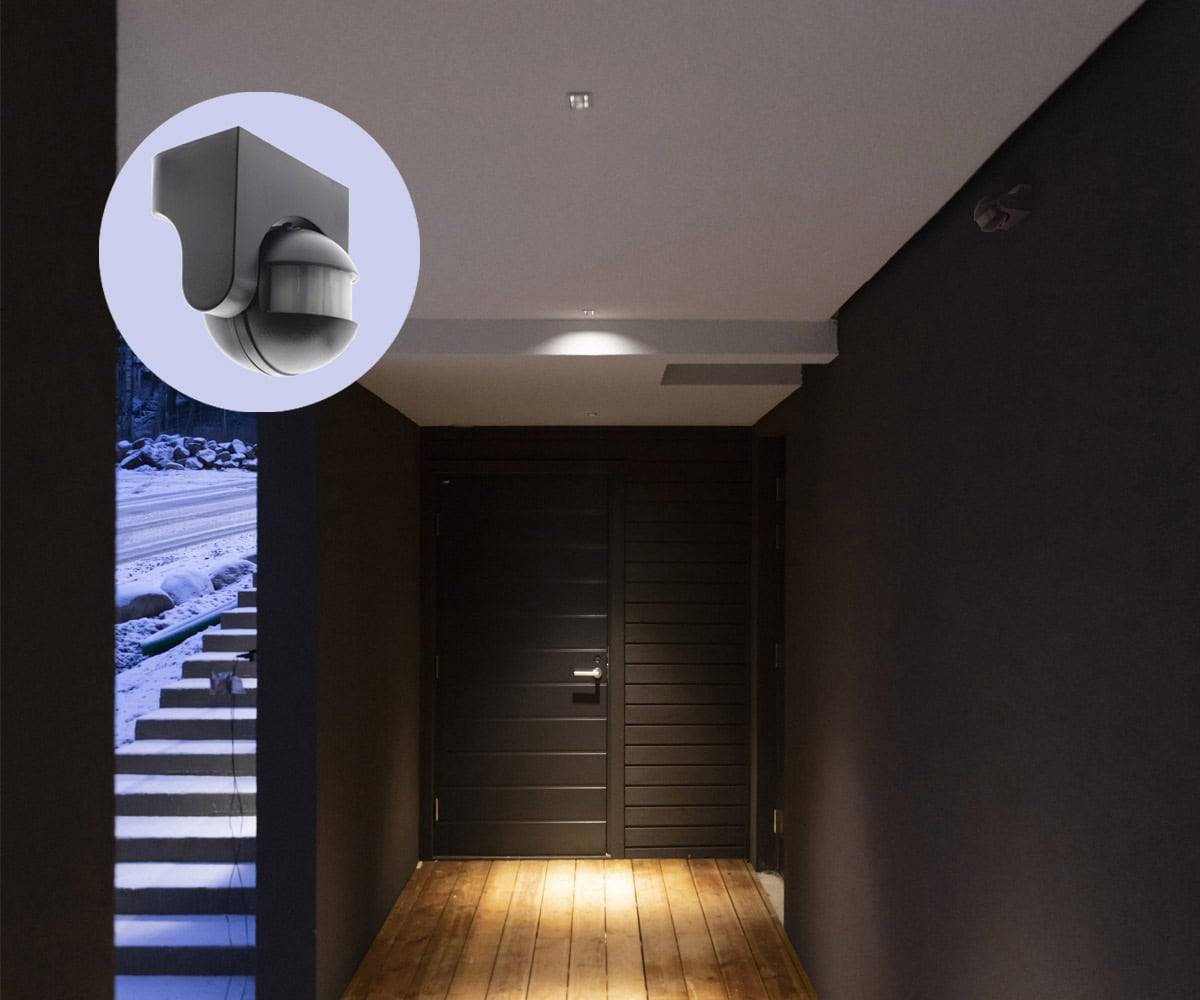 Recessed luminaires are controlled by a motion and light sensor.