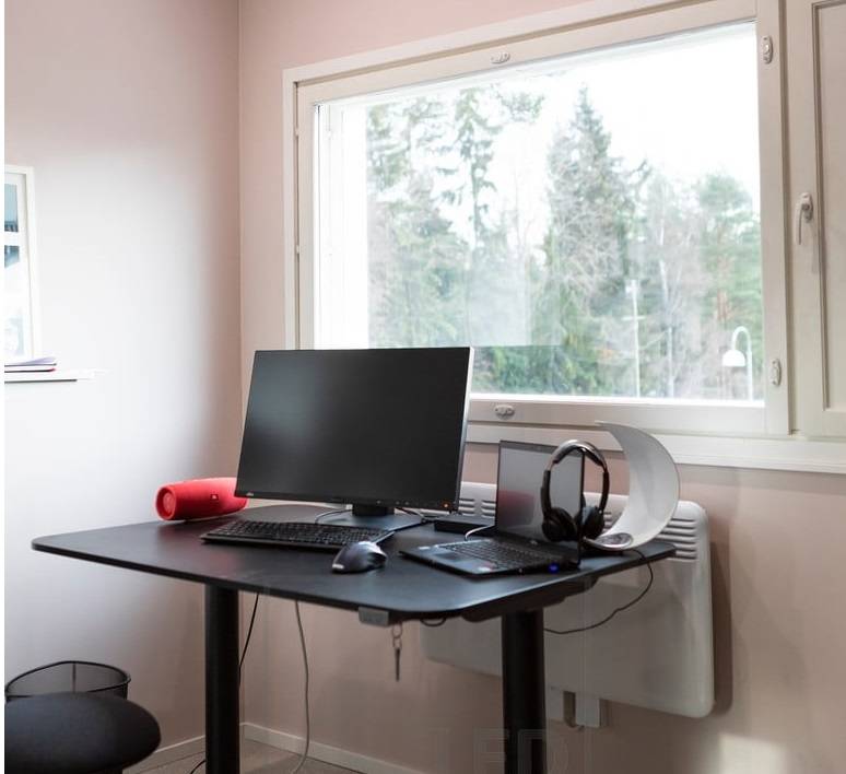 Home office natural light and artificial light. Lighting design also affects mood when working remotely.