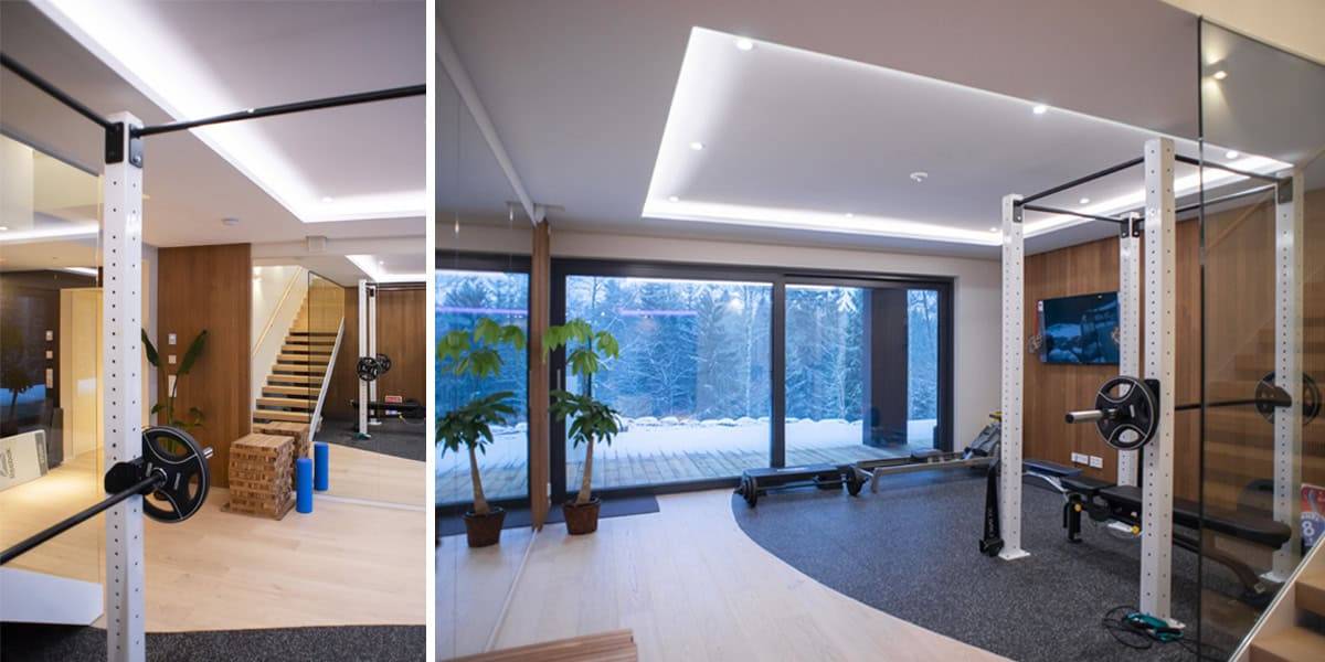 Recessed spotlights and indirect led strip lighting in the home gym.