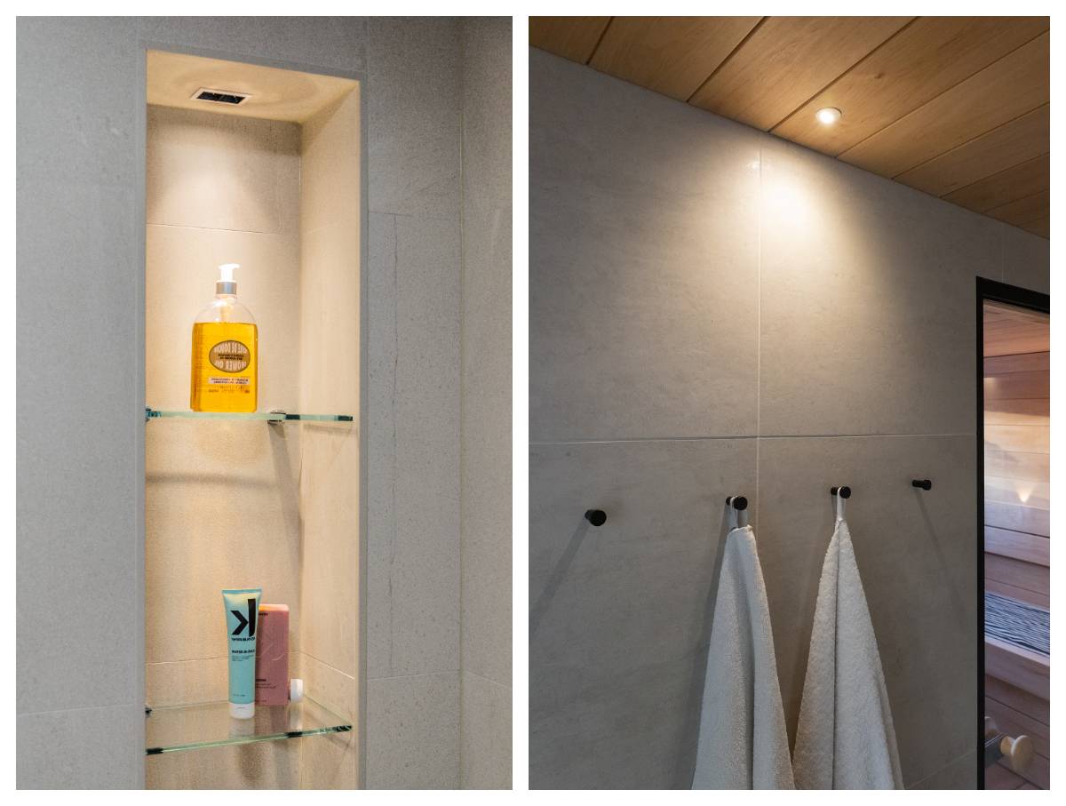 In the bathroom, a decorative and atmospheric look has been achieved by illuminating the three-tiered narrow glass shelf with a detergent dispenser from above. In the second picture, a small sauna spot recessed in the ceiling provides light to the towel hooks.