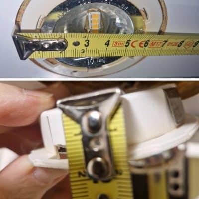 A light fixture with a measuring tape showing a diameter of 7 cm.