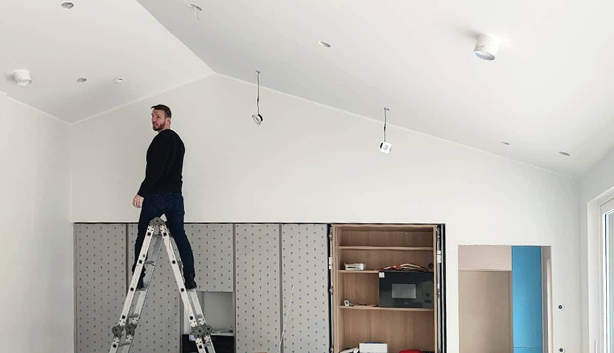 Installing LED spotlights on the ceiling.