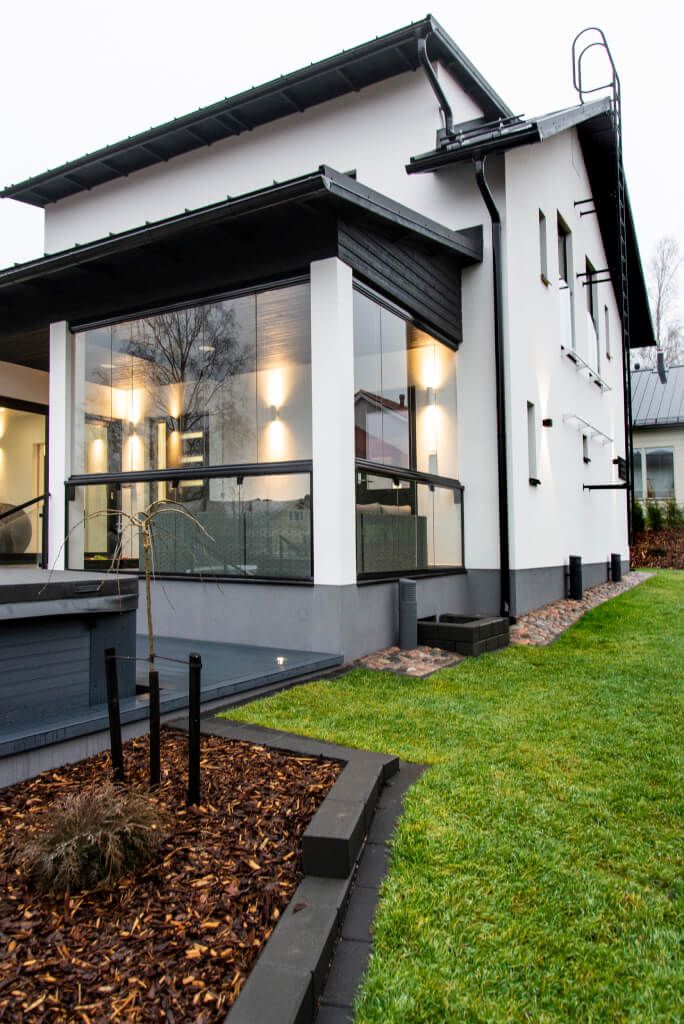 stone_house_exterior_lighting_exterior_walls_white_terrace_pot_ledstore.fi