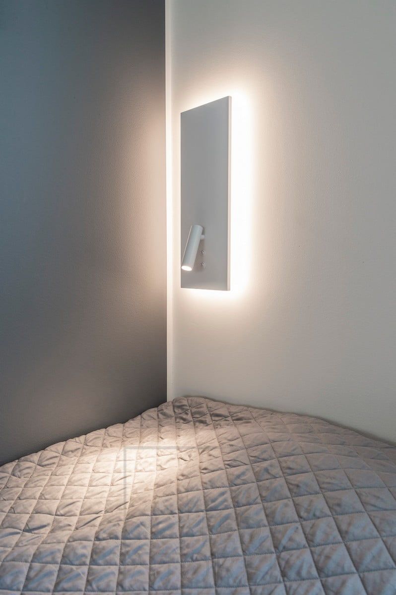 White NIGHT night and reading light, with directional reading light. The indirect mood light and reading light have separate switches. Also available with plug and in black. Ledstore.fi
