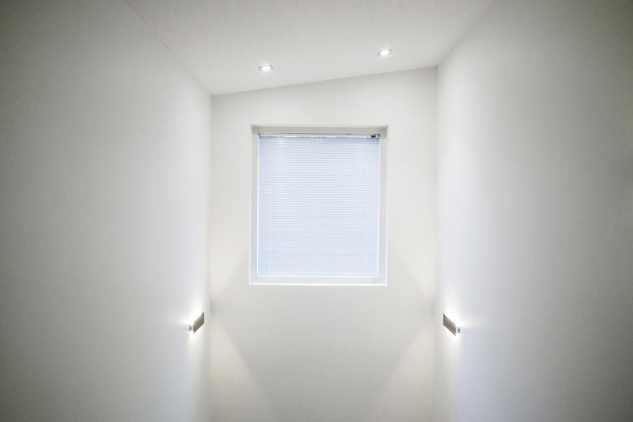 Green background, white square in the middle with "LED STORE" in bold, stacked letters highlights energy efficient lighting solutions.