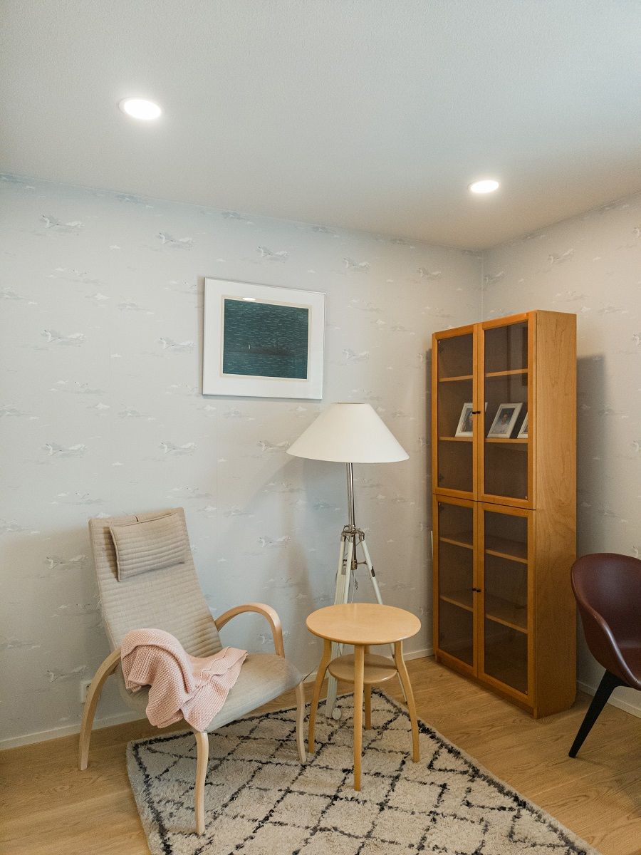 Small round panel lamps on the ceiling of a study