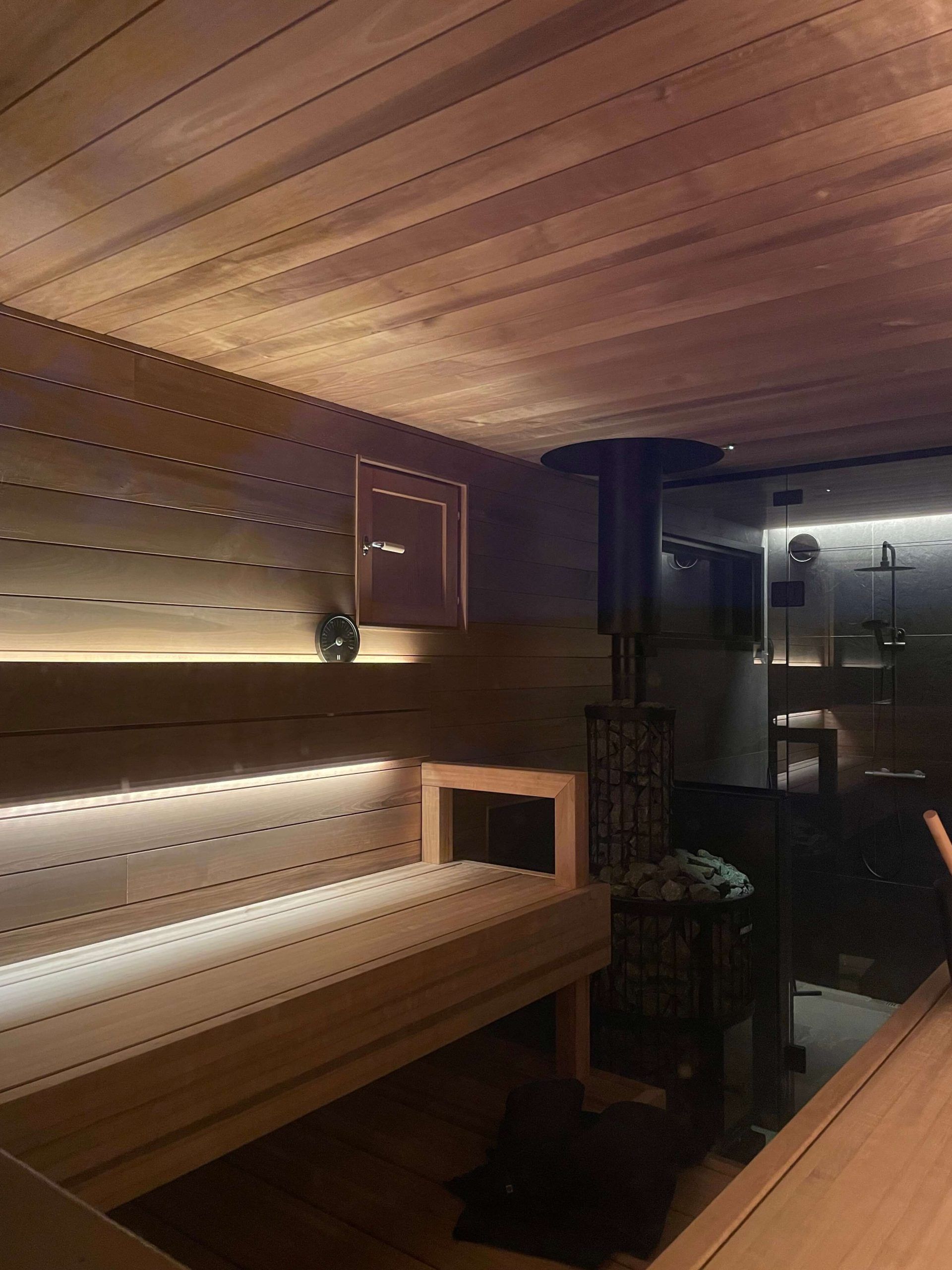 Lighting in the back of the sauna in two directions.