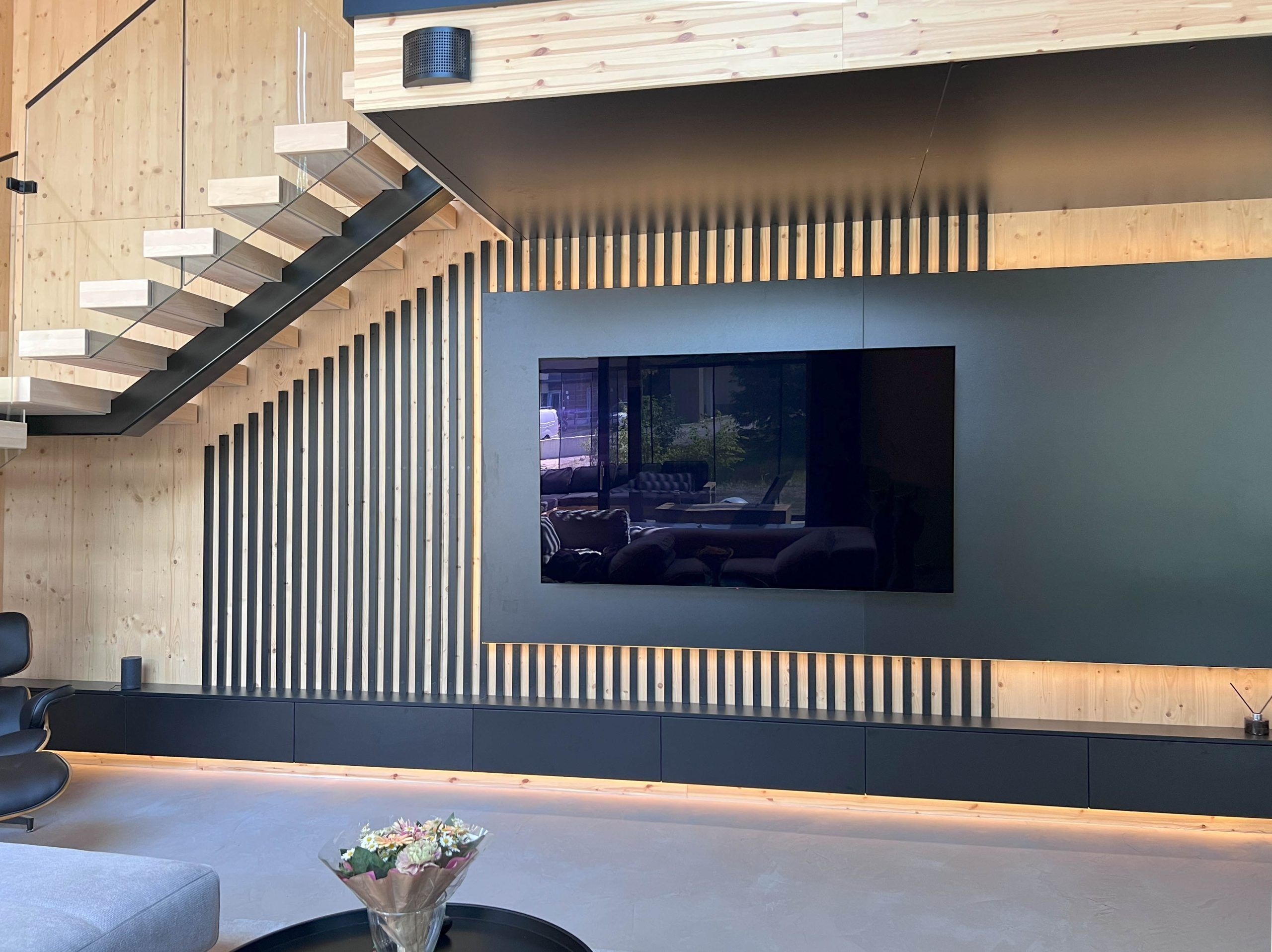 Viewed from the front, a light mounted in the background visually separates the panel from the wall.