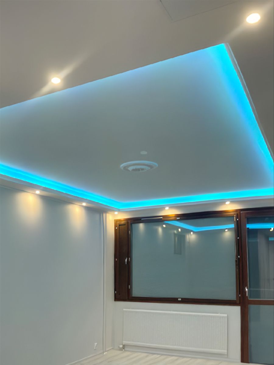 General lighting created with led spotlights, with indirect led strip lighting.